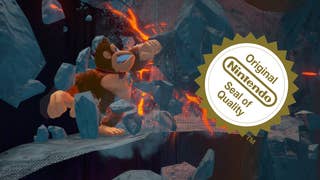 DK Bananza screenshot cropped to show DK smashing some rubble with the camera clipping through faded near-ground scenery, overlaid with an Official Nintendo Seal of Quality