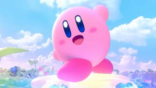 Kirby Air Rider trailer image showing Kirby speeding beneath blue skies on a star-shaped racer.