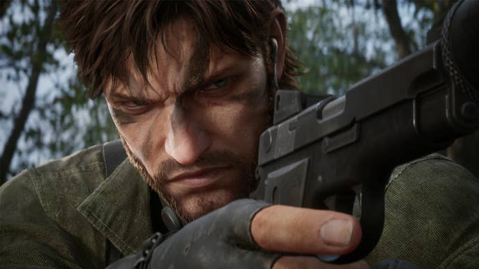Naked Snake holding a gun and wearing camo in the jungle in Metal Gear Solid Delta: Snake Eater.